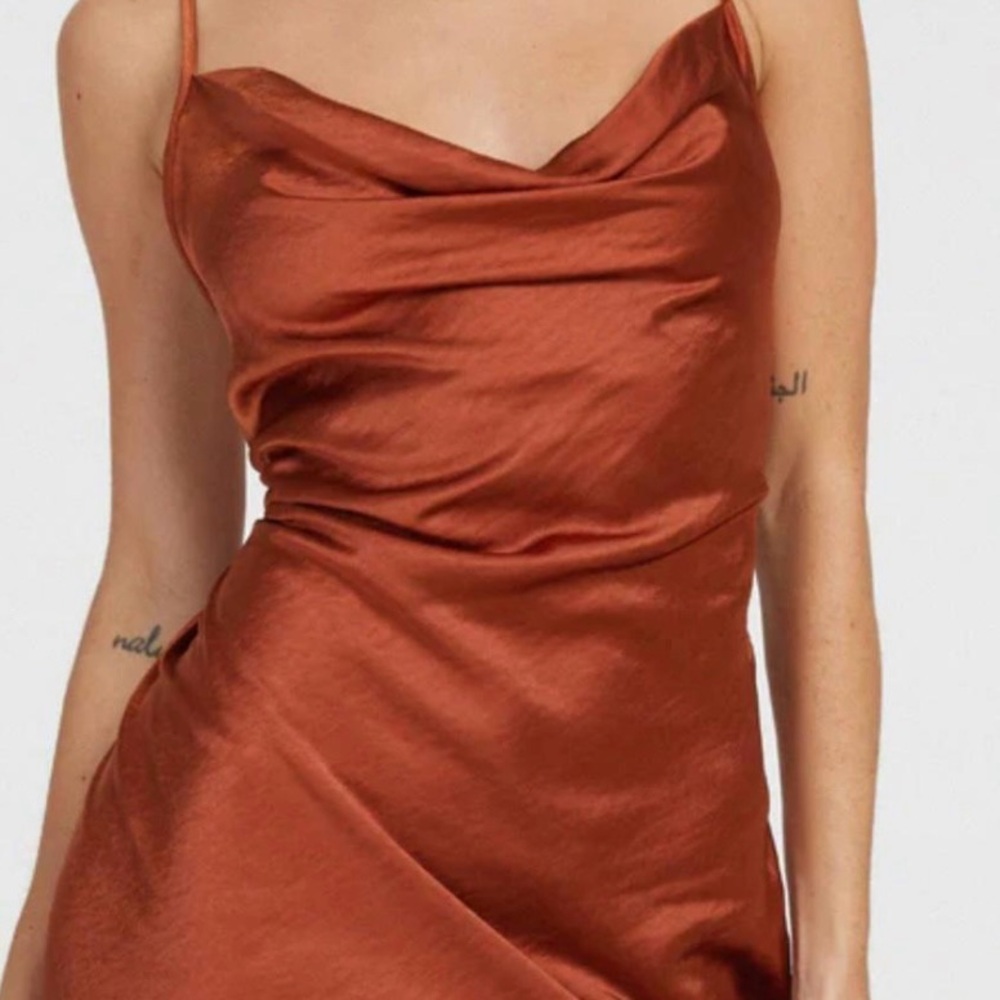Amazing mini dress, fits beautifully. Tight at waist with slight flare at bottom